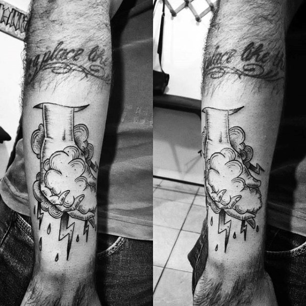 Funny black and white hand with lightning cloud tattoo on arm