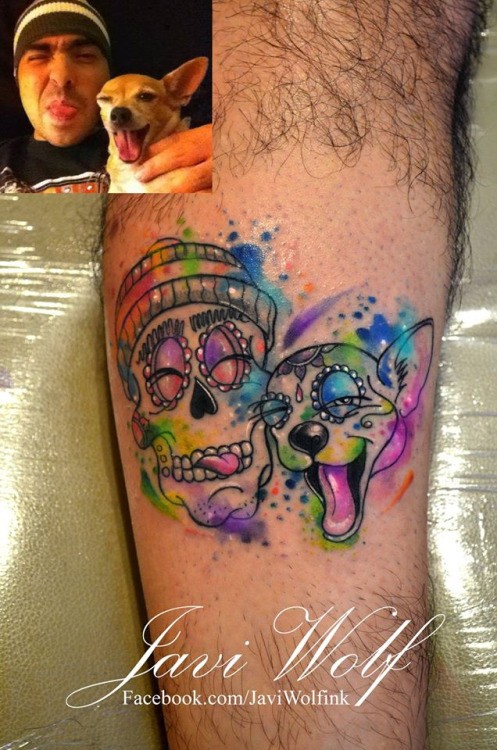 Funny cartoon style colored smiling skull with dog tattoo on leg