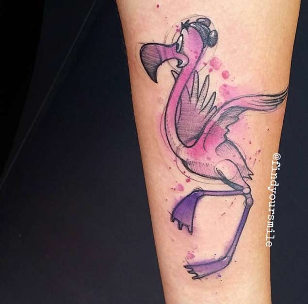 Funny cartoon style painted flamingo tattoo on arm