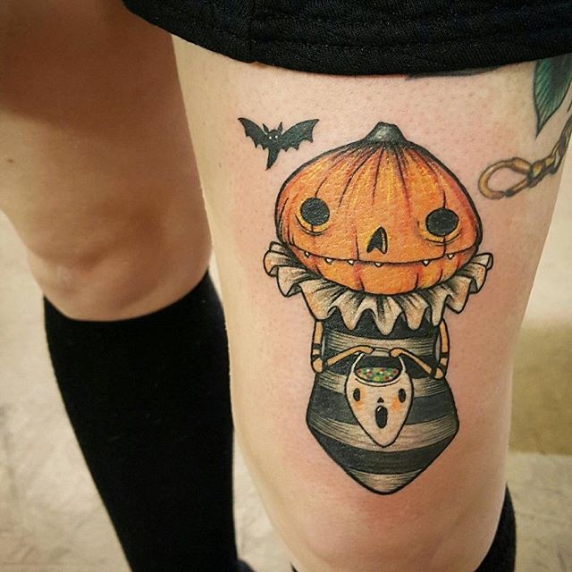 Funny colored and detailed Halloween themed little tattoo on thigh