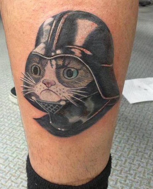 Funny colored grumpy cat in Darth Vader&quots helm colored thigh tattoo