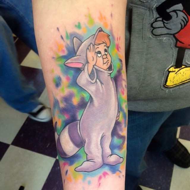 Funny illustrative style colored forearm tattoo of Peter Pan