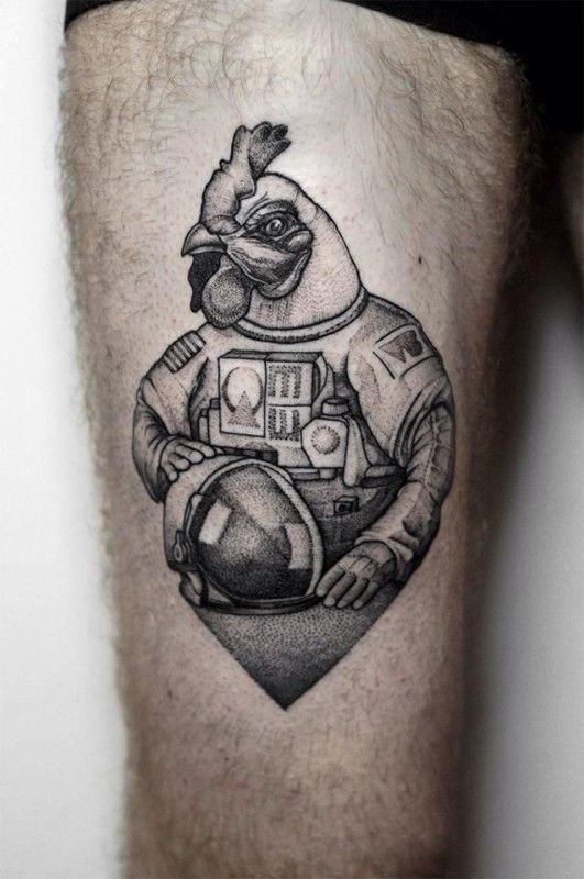 Funny looking dotwork style thigh tattoo of chicken astronaut