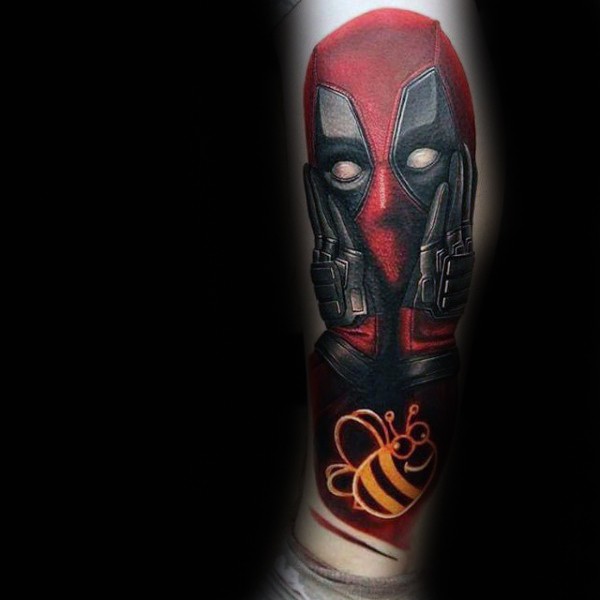 Funny painted and colored arm tattoo of Deadpool with small bee