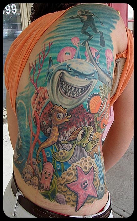 Funny underwater world tattoo on back
