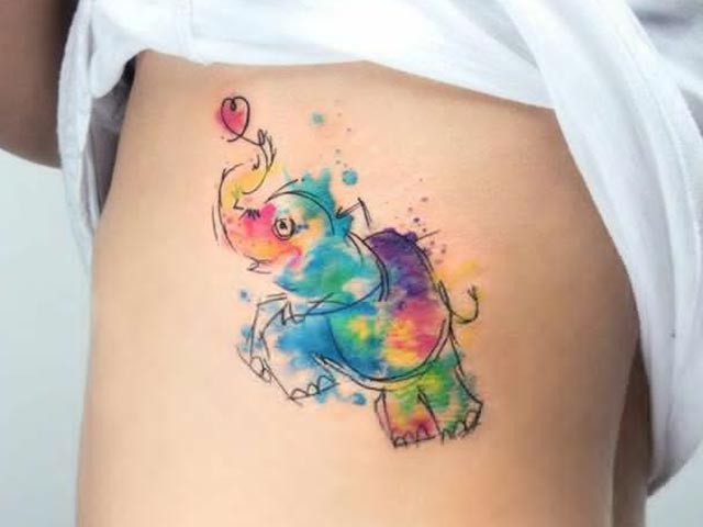 Funny watercolor style side tattoo of cute looking elephant