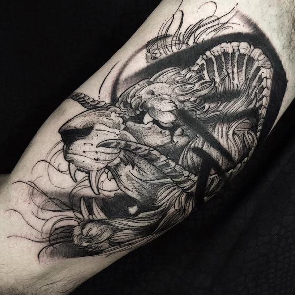 Furious mad roaring life with horns designed tattoo in engraving style