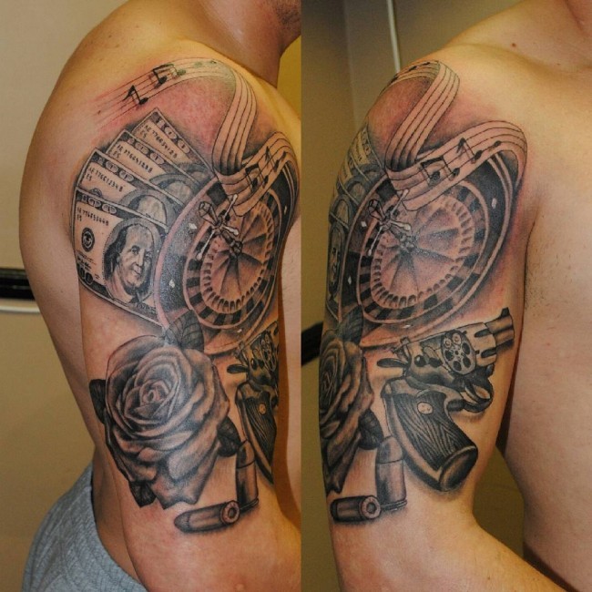 Gambling themed black and white casino roulette tattoo on shoulder combined with pistol and money