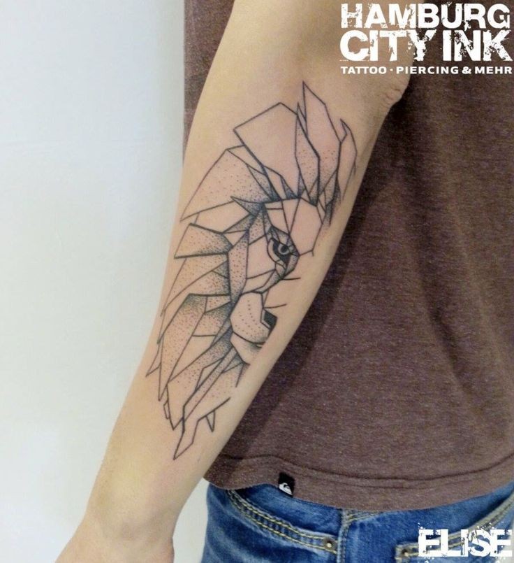 Geometrical style black ink arm tattoo of lion head half