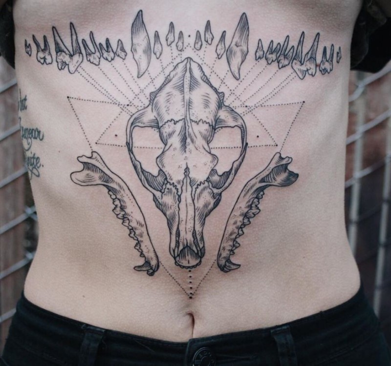 Geometrical style black ink belly tattoo of animal skull with geometrical figures