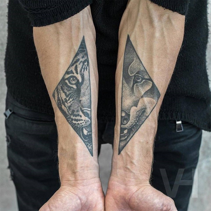 Geometrical style by Valentin Hirsch forearm tattoo of split animals portraits