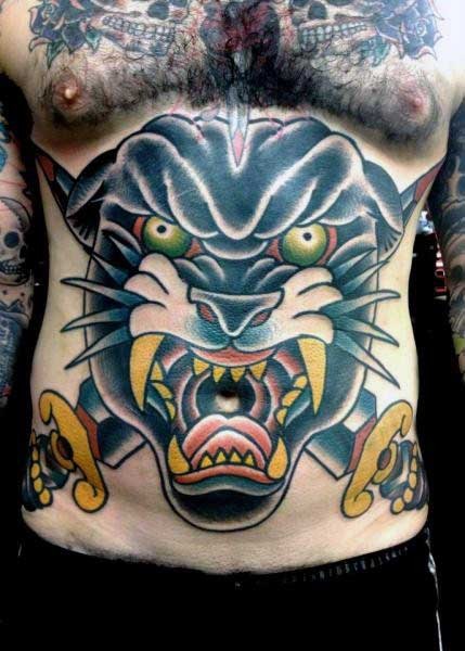 Giant whole belly colored furious black panther and sharp crossed daggers tattoo in old school style