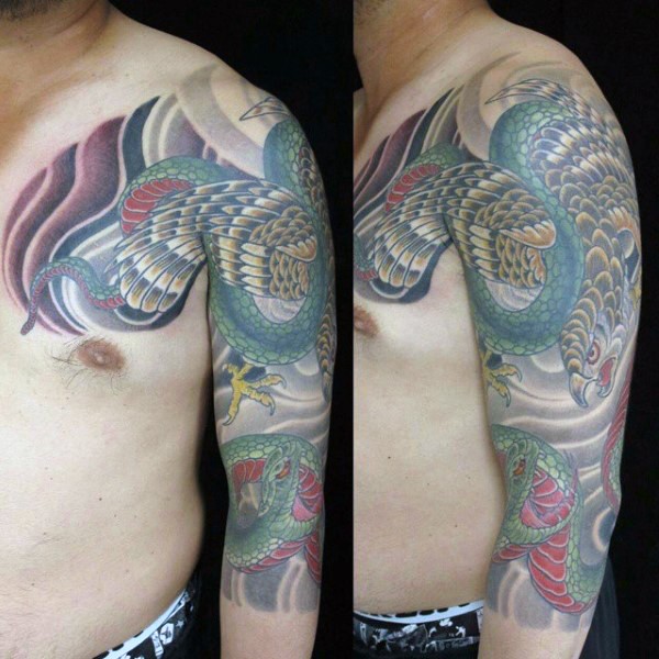 Gorgeous Asian style colored eagle fighting the snake tattoo on sleeve and chest