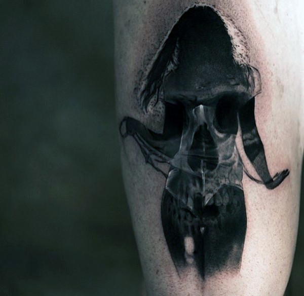 Gorgeous black and white leg tattoo of woman silhouette stylized with skull