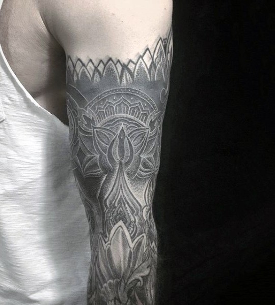 Gorgeous black and white mystical tattoo on sleeve