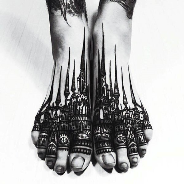 Gorgeous black ink henna old city tattoo on feet