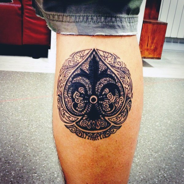 Gorgeous black ink spades symbol tattoo on leg