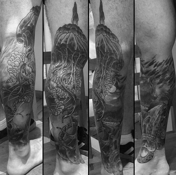 Gorgeous designed and detailed big jelly-fish tattoo on leg