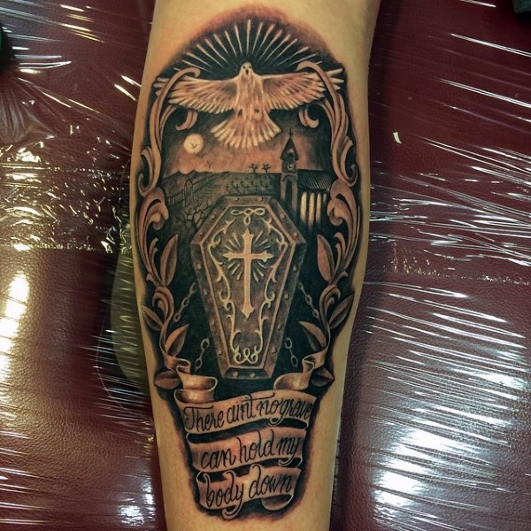 Gorgeous designed colored coffin with lettering and eagle tattoo on arm