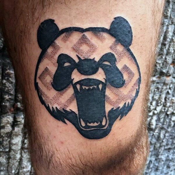 Gorgeous looking black ink thigh tattoo of evil panda head