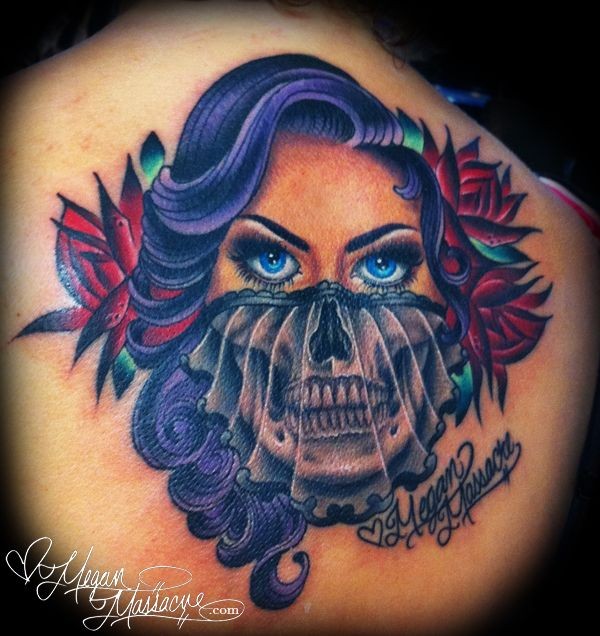 Gorgeous looking colored upper back tattoo of woman face with skull part
