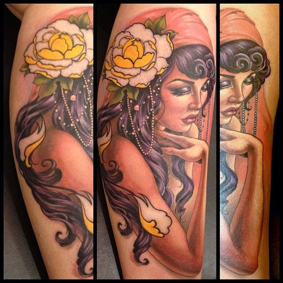Gorgeous natural looking seductive woman tattoo on leg stylized with flower