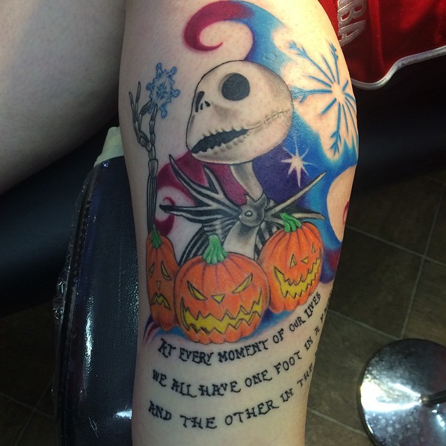 Gorgeous painted colorful monster tattoo with pumpkins and lettering