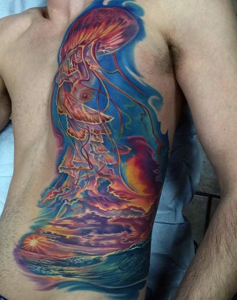 Gorgeous painted multicolored jelly-fish with ocean tattoo on chest