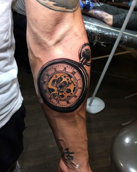 Gorgeous painted very realistic old mechanic clock tattoo on arm