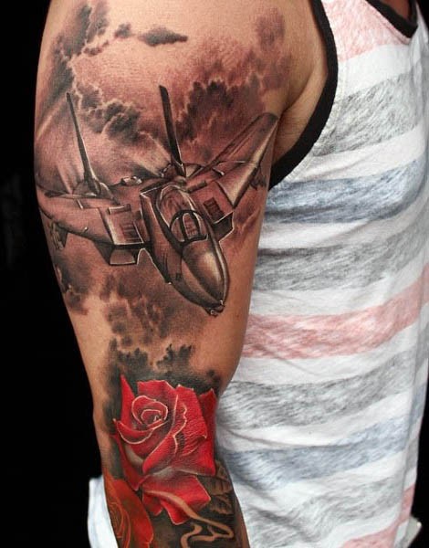 Gorgeous realism style colored sleeve tattoo of modern fighter plane and rose flower