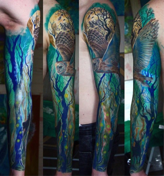 Gorgeous realism style large sleeve tattoo of owl flying in night forest
