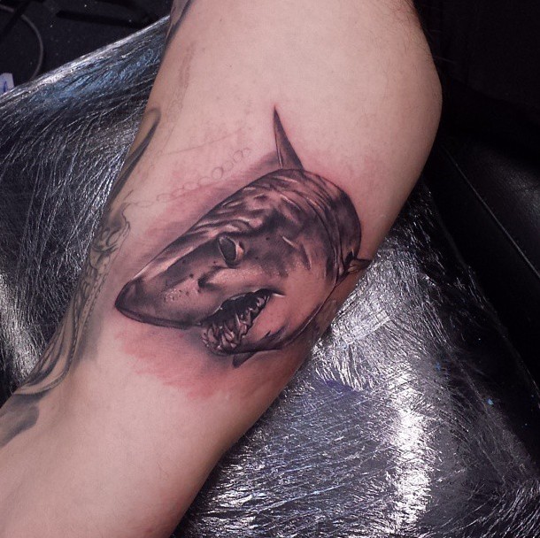 Gorgeous realistic looking black ink 3D arm tattoo of shark
