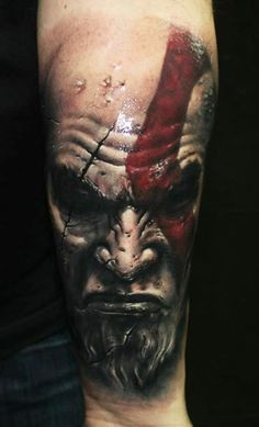 Gorgeous very detailed 3D like colored forearm tattoo of evil barbarian