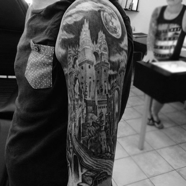 Gorgeous very detailed black and white big medieval castle tattoo on sleeve