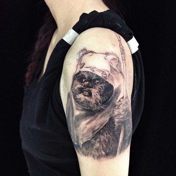 Gorgeous very detailed black ink shoulder tattoo of ewok