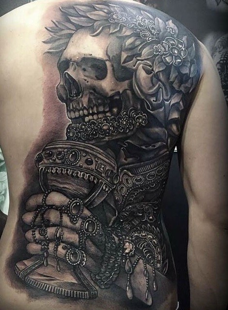 Gorgeous very detailed whole back tattoo of ancient skeleton with jewelries