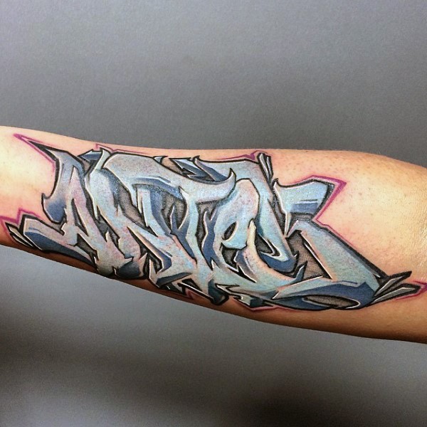 Graffiti style colored arm tattoo of interesting lettering