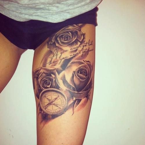 Gray roses witn watch tattoo on hip