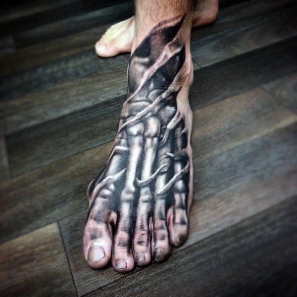 Gray washed style amazing looking foot tattoo of human bones
