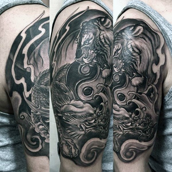 Gray washed style black ink shoulder tattoo of tiger with dragon