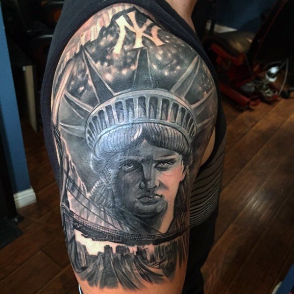 Gray washed style detailed American symbols tattoo combined with Statue of Liberty