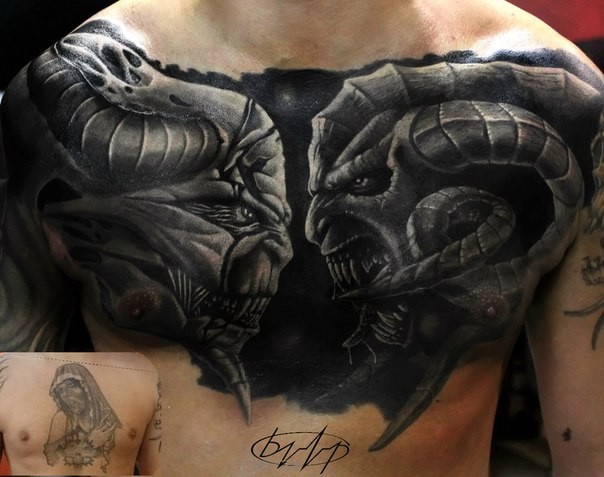 Gray washed style detailed chest tattoo of demonic aliens