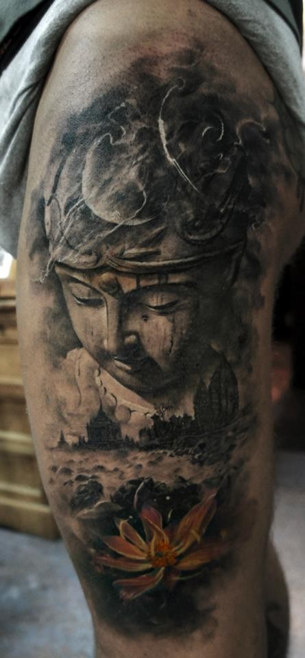 Gray washed style detailed shoulder tattoo of Buddha statue with ancient city