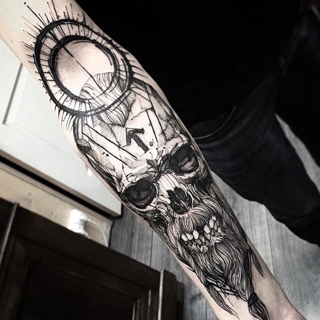 Gray washed style impressive looking large forearm tattoo of old mystical skull