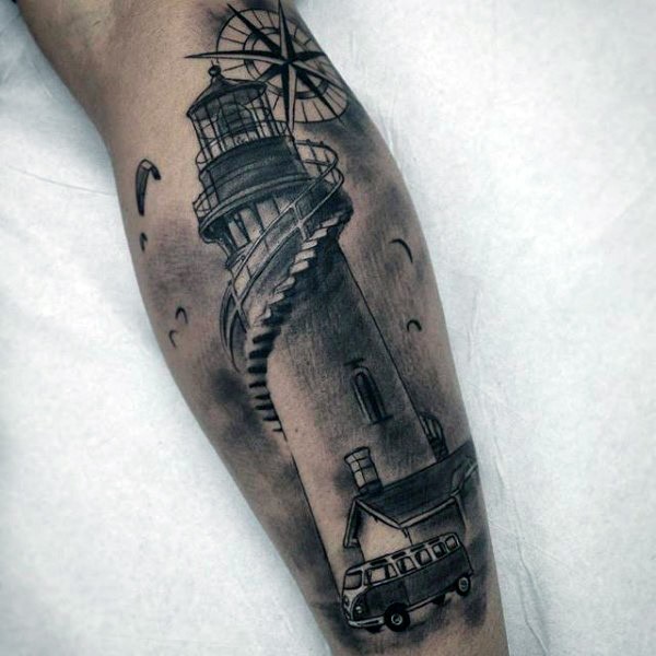 Gray washed style interesting looking leg tattoo of lighthouse and small car
