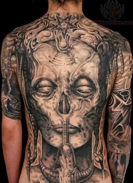 Gray washed style large whole back tattoo of demonic skull with star