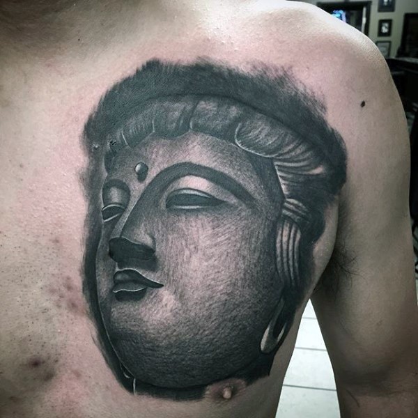 Gray washed style medium sized detailed chest tattoo of Buddha statue head