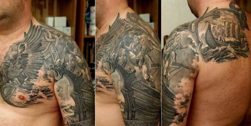 Gray washed style shoulder tattoo of viking ship and dragon