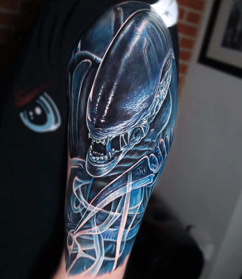 Great Alien tattoo in blue color