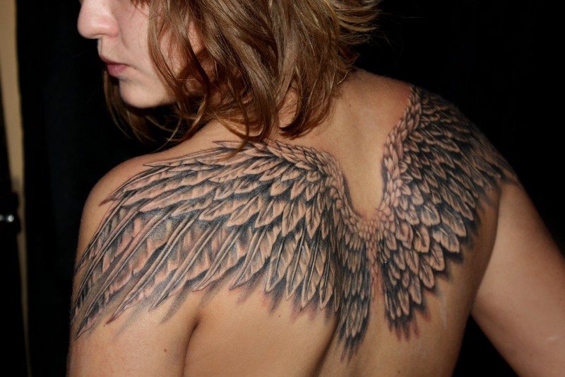 Great angel wings tattoo for women